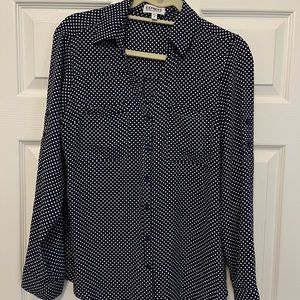 Navy and white polka dot women’s dress shirt from Express.
